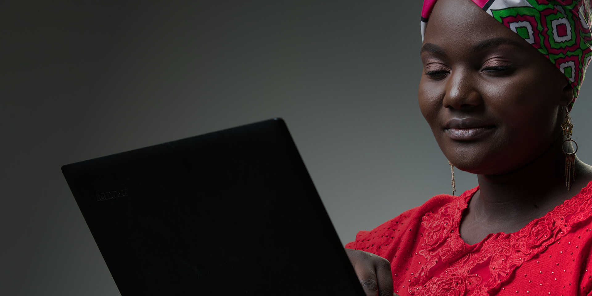 Valerie Busaka, an inABLE computer Instructor using a laptop